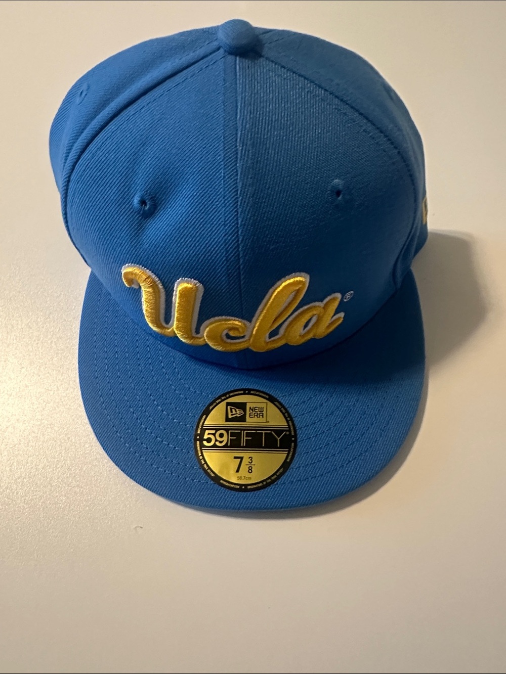 New Era UCLA Script Fitted Cap in Blue and Yellow